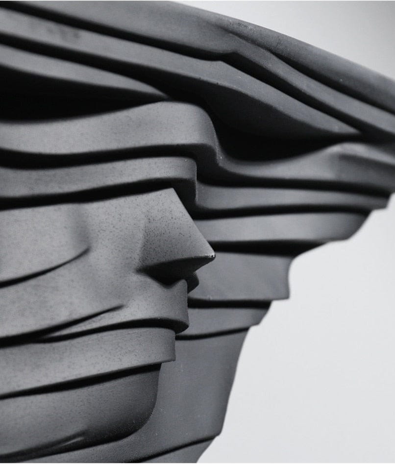 Sculpture of Abstract Wind-Blowing Character