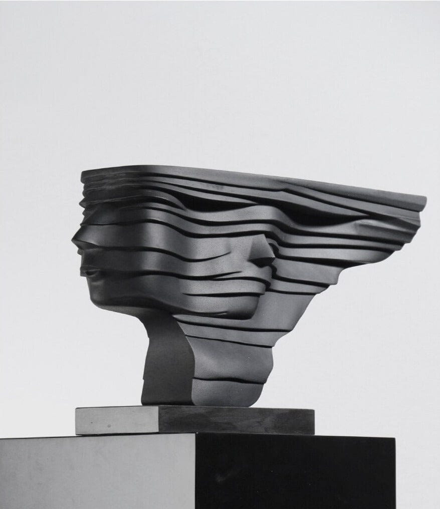 Sculpture of Abstract Wind-Blowing Character