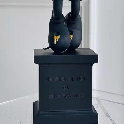 Statue of a Tombstone with Black Ghost Mouse