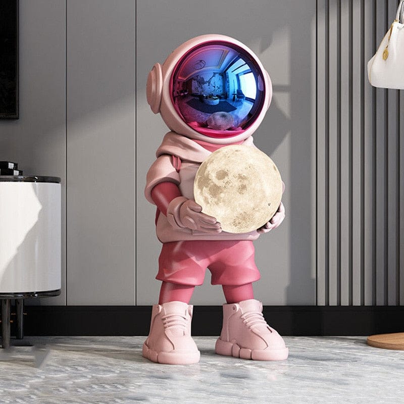 Statue of Astronaut Holding Moon, Life-Size