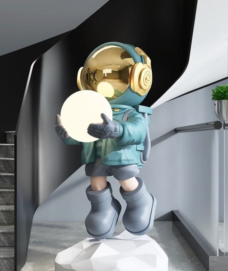 Statue of Astronaut with Moon in Hands, Life-Size
