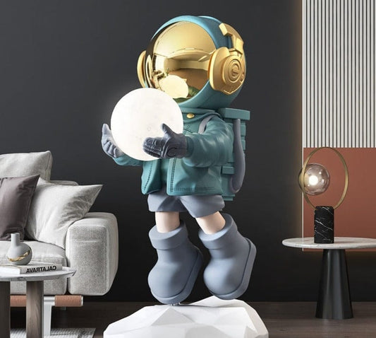 Statue of Astronaut with Moon in Hands, Life-Size